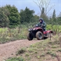 Quad Biking in North Yorkshire - Quad going over hill